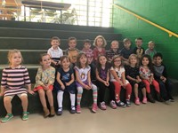 Children on gymnasium steps